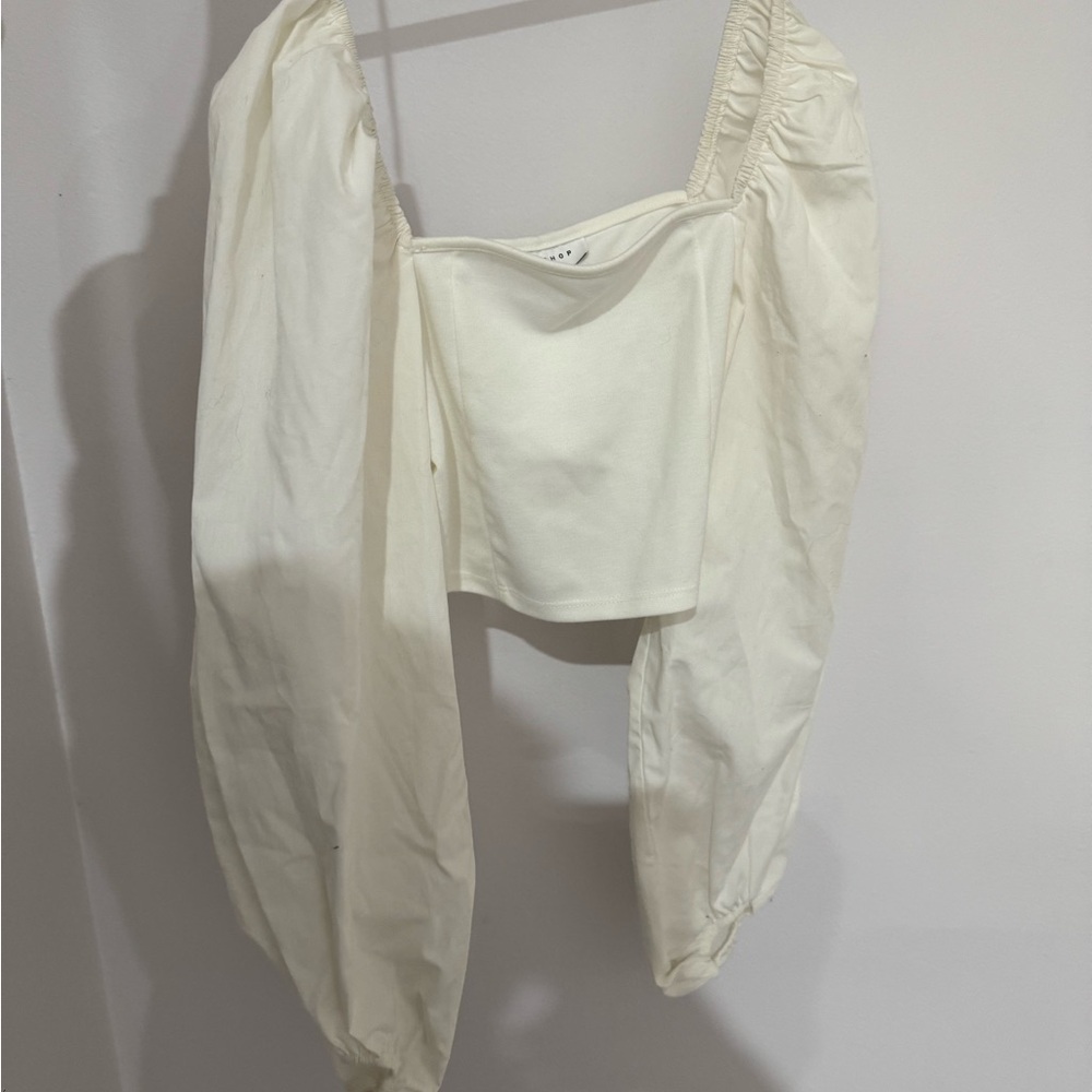 Top shop white long sleeve blouse. Never worn with tags still on